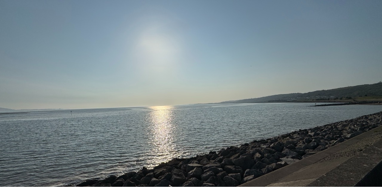 Sunlight over the sea beside Llanelli’s Millennium Coastal Path